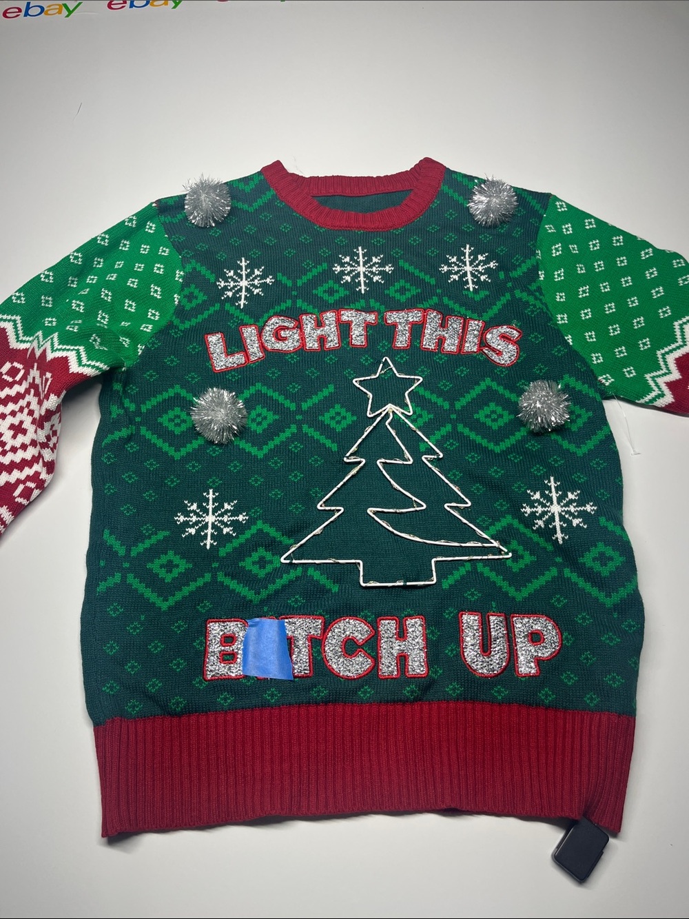 Spencer’s Novelty Christmas Sweater Lights Up
